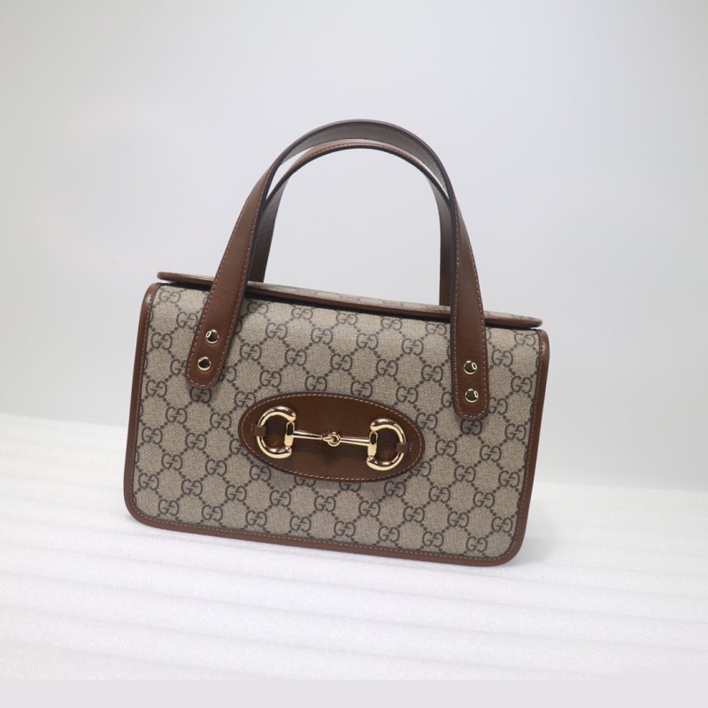 G*u*i top handle bags